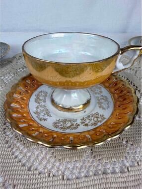 VINTAGE GOLDEN FOOTED CUP & "PIERCED" ROSE SAUCER LUSTERWARE